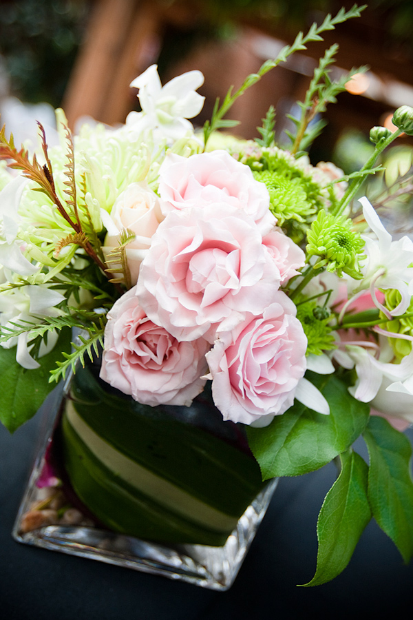 pink rose centerpiece - real wedding photo by Seattle photographer Laurel McConnell